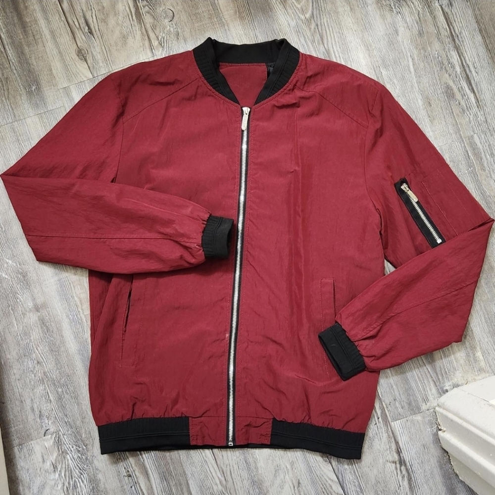 Red zip-up jacket with extra pockets